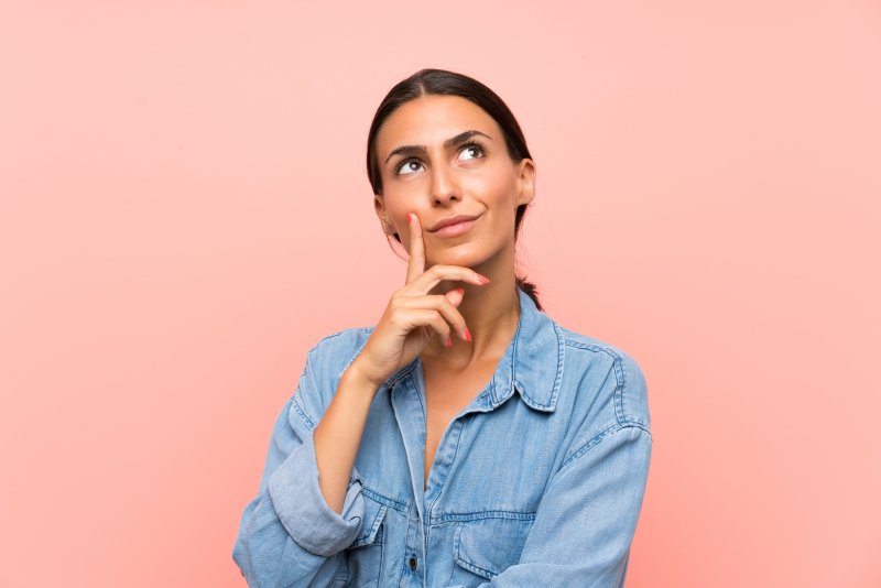 young woman wondering and thinking
