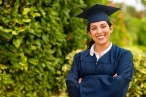 a graduating student smiling